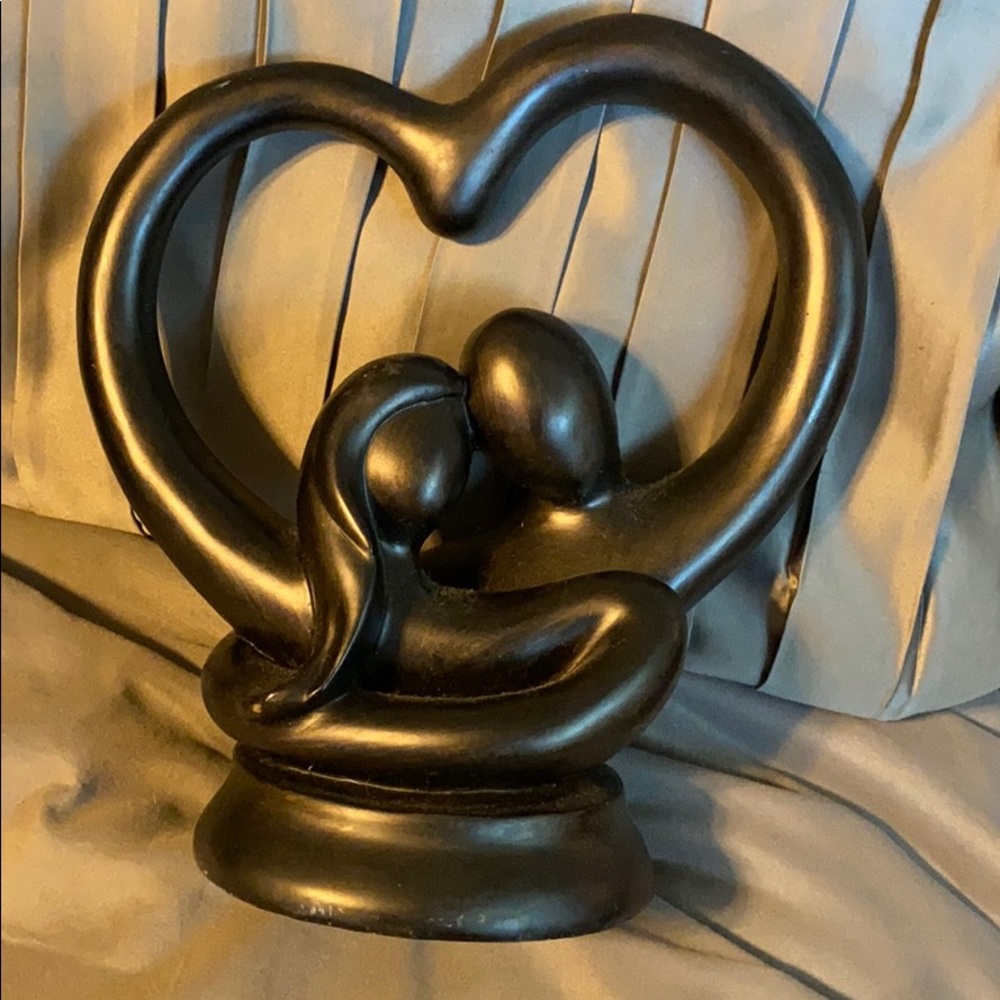 Man and woman heart statue
